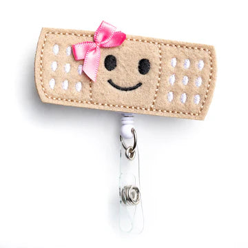 Girl Bandage Badge Reel - Ascension Golf Carts, LLC