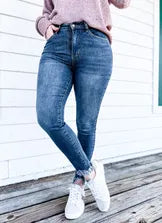 Judy Blue Mid-Rise Shark Bite Hem Skinny Jeans