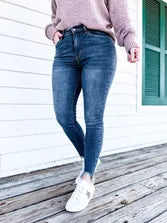Judy Blue Mid-Rise Shark Bite Hem Skinny Jeans